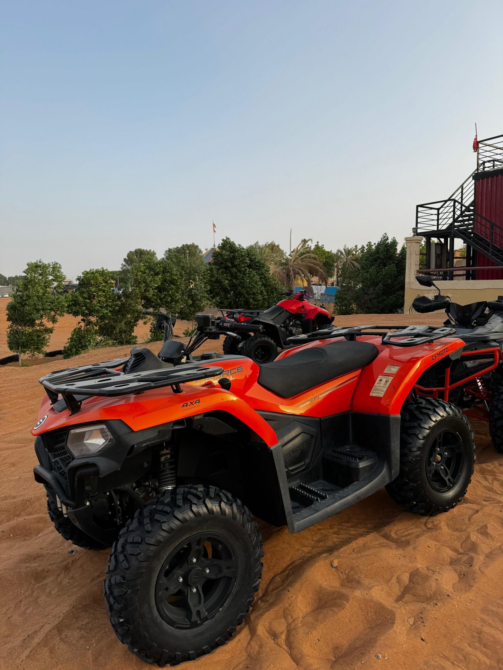 Side profile of 300cc quad bike in the sand